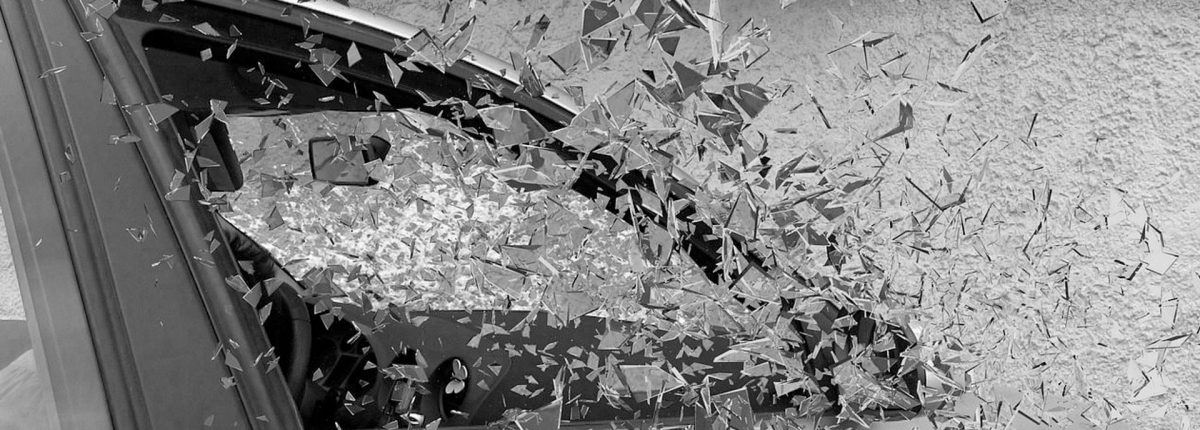 shattered car window after accident