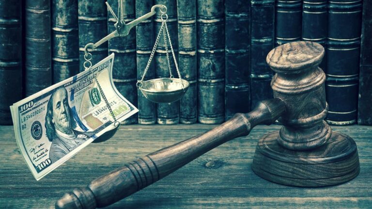 gavel & money scales of justice